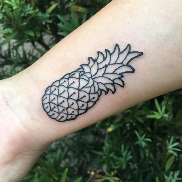 pineapple tattoo on wrist