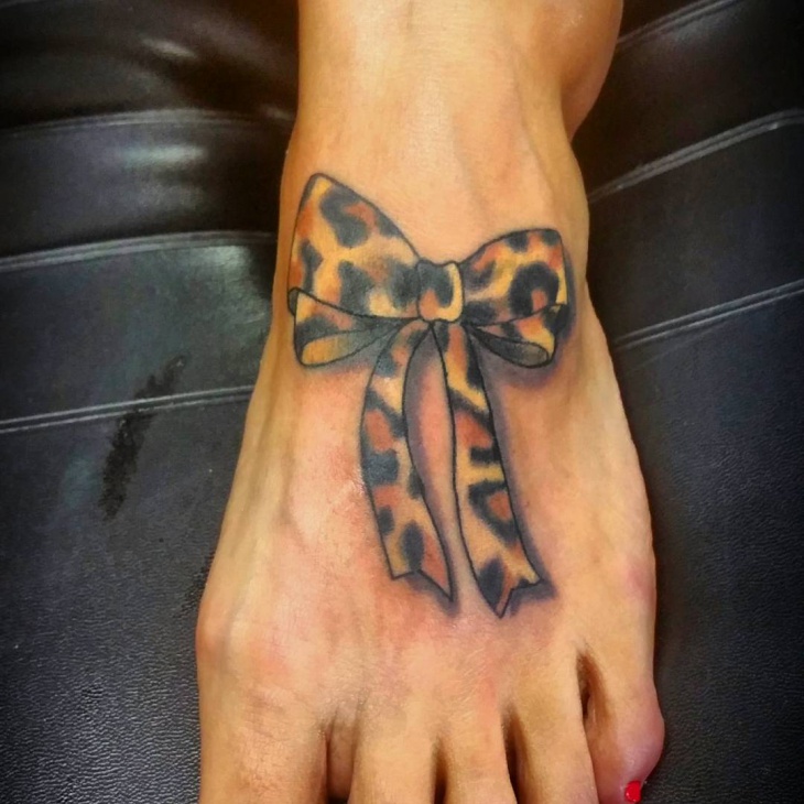 bow with cheetah print tattoo