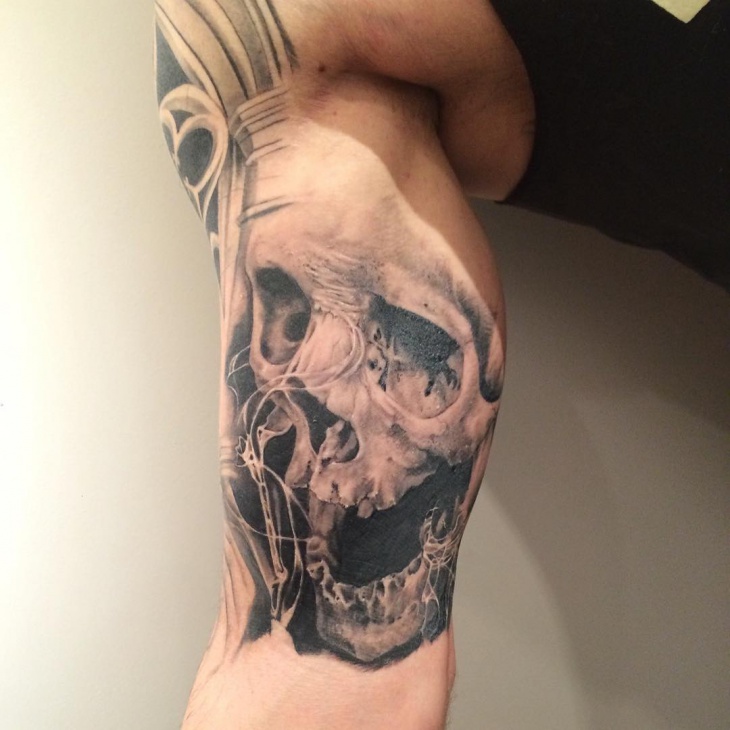 skull and smoke tattoo design