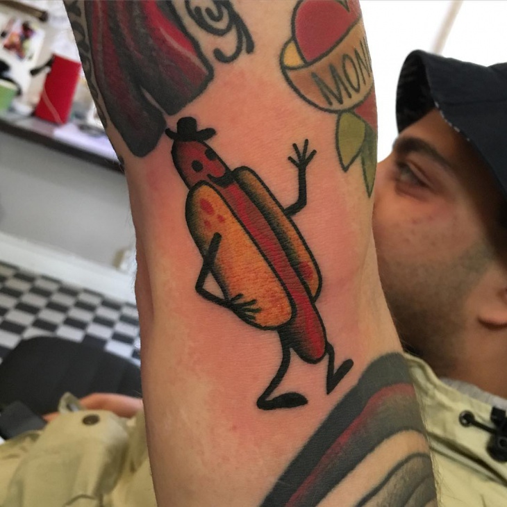 unique hot dog arm tattoo