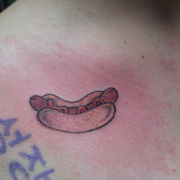 hot dog tattoo on shoulder