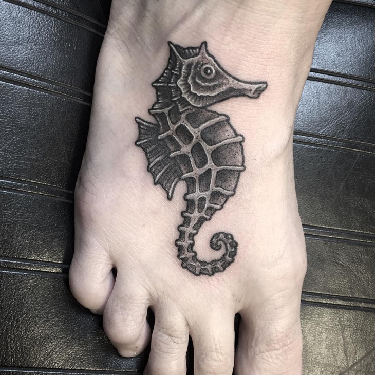 seahorse tattoo on foot