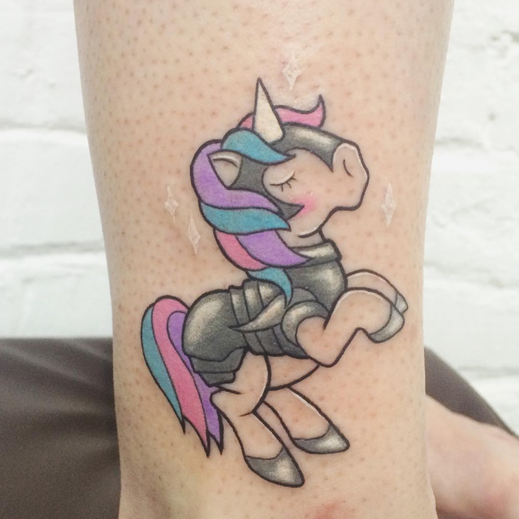 unicorn doll tattoo idea