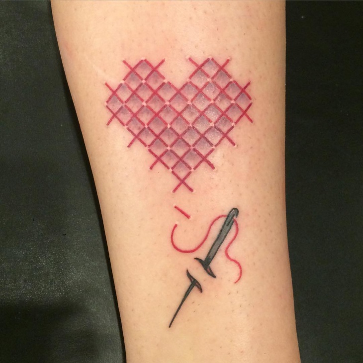 heart cross stitch tattoo