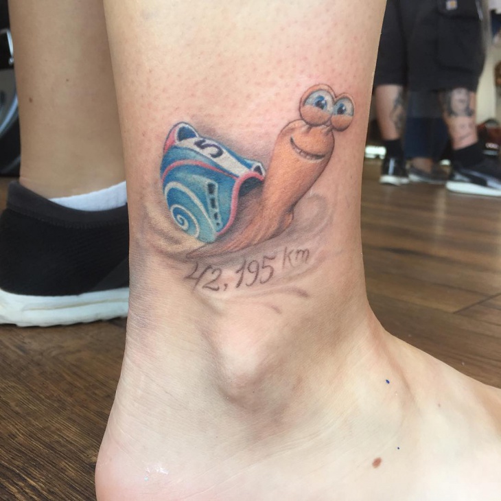 cartoon snail tattoo