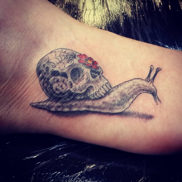 snail skull tattoo design