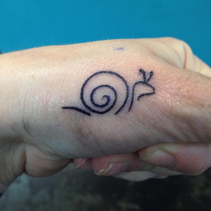 cute snail tattoo design