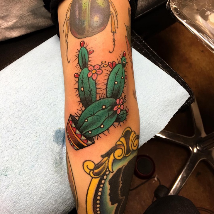 colorful cactus sleeve tattoo