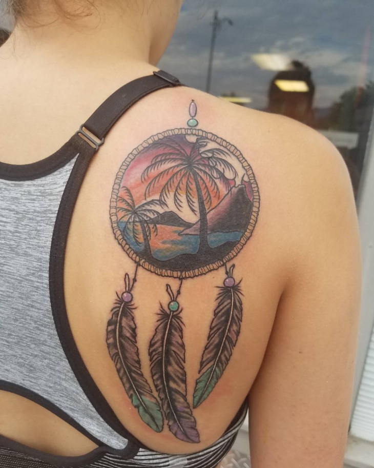 beach tattoo on shoulder
