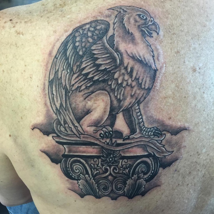 traditional griffin tattoo