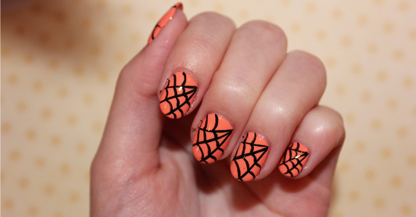 5. "Spooky spider web nail design inspired by Wednesday Addams" - wide 5