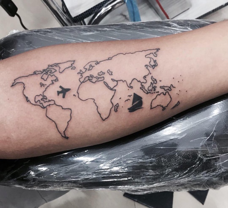 world map tattoo on hand