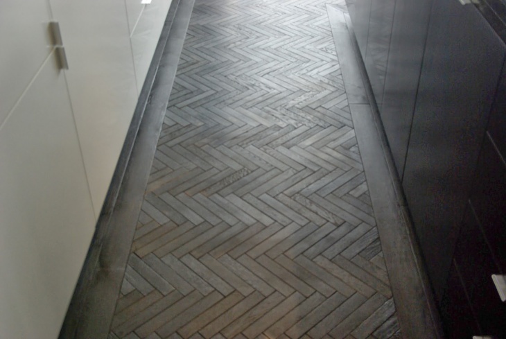 beveled tile in herringbone pattern
