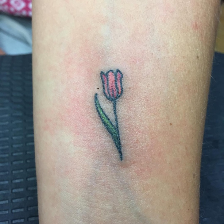 small flower tattoo idea
