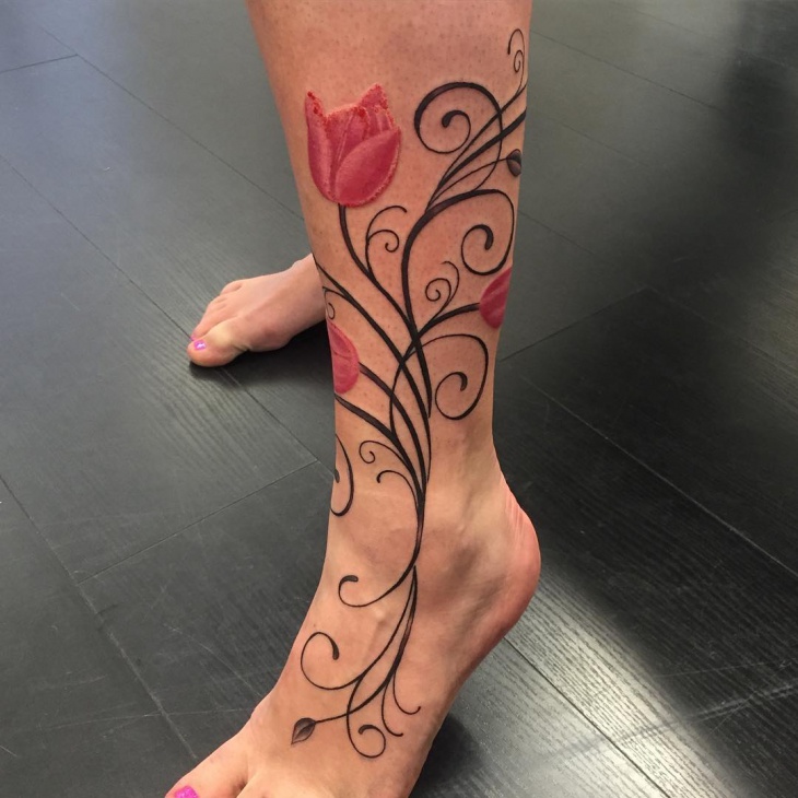 pretty tulip leg tattoo