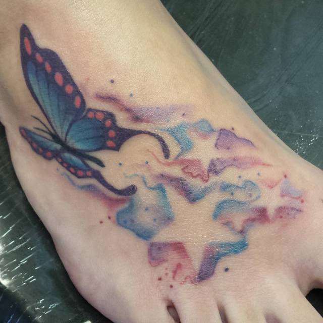 colorful tattoo on foot