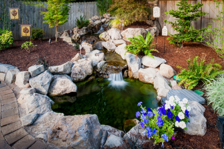 small stone garden pond idea 