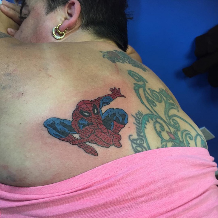 spiderman tattoo on back
