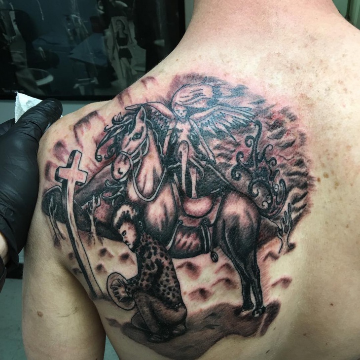 cowboy tattoo for back