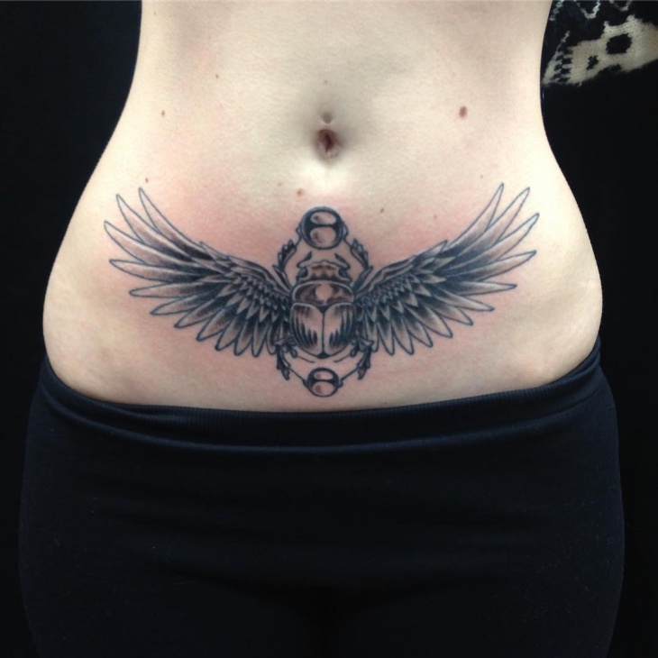 scarab wings tattoo
