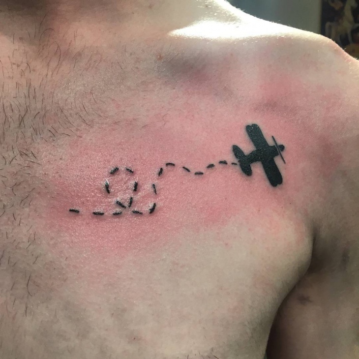airplane chest tattoo