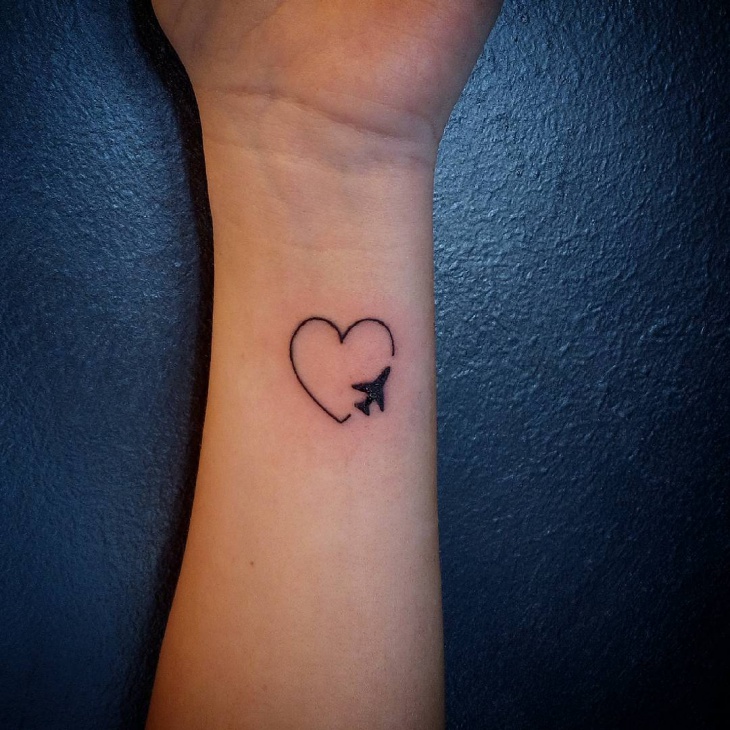 heart airplane tattoo idea