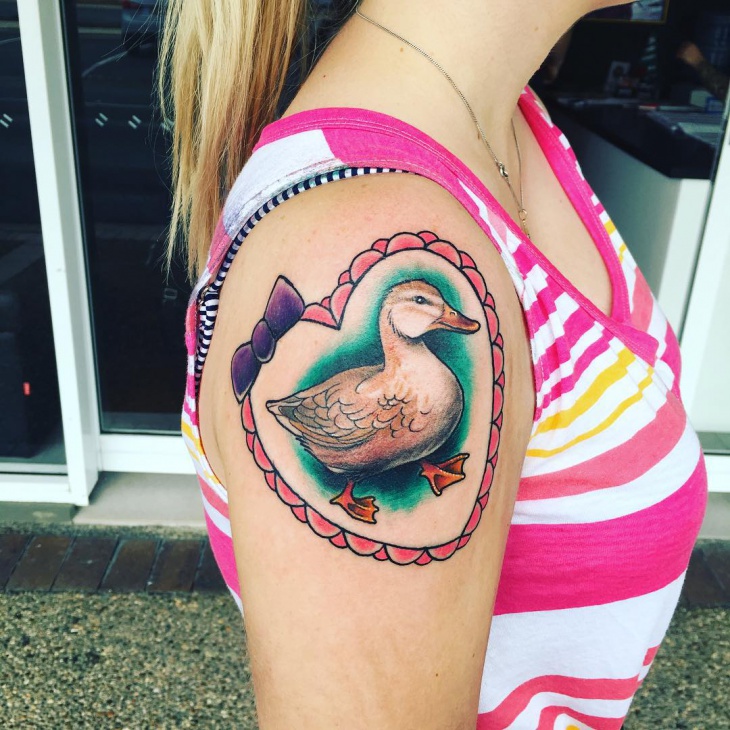 duck tattoo on shoulder