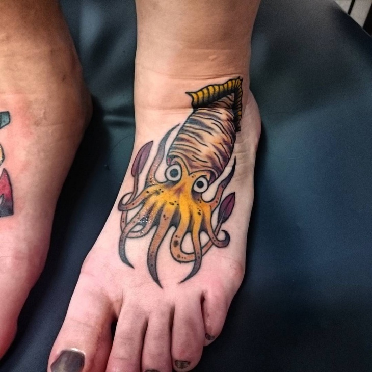 squid tattoo on foot