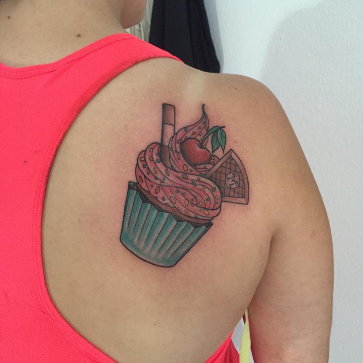 cupcake tattoo on shoulder