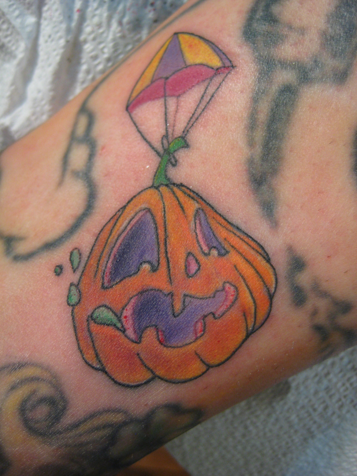 pumpkin parachute tattoo