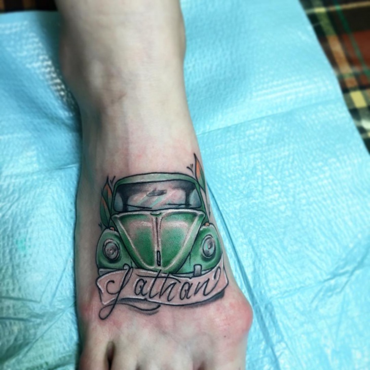 car tattoo on foot