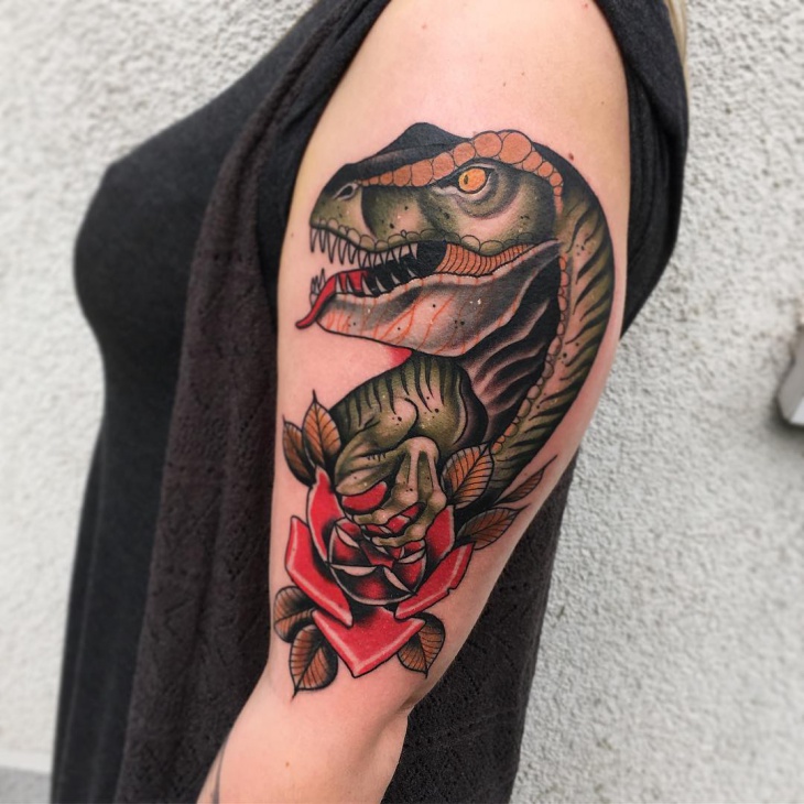 dinosaur tattoo on sleeve