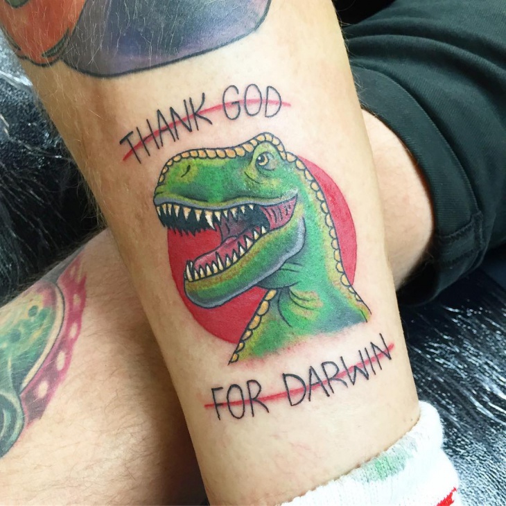 green dinosaur tattoo