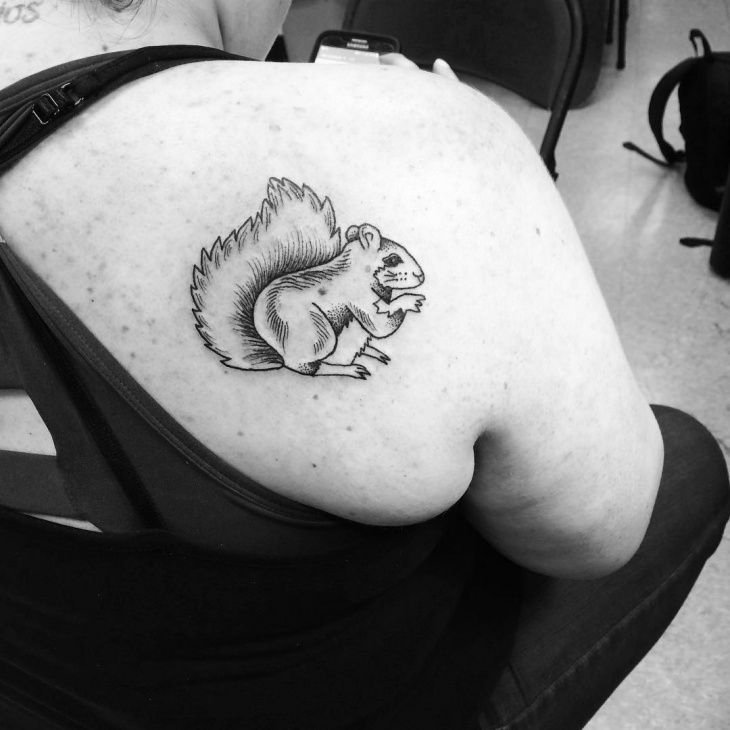 black work squirrel tattoo