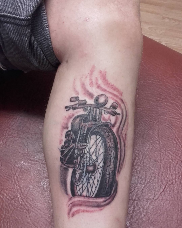 sports motorcycle tattoo