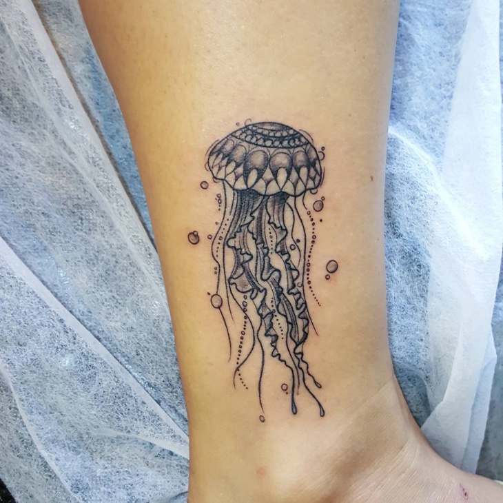 black work jellyfish tattoo