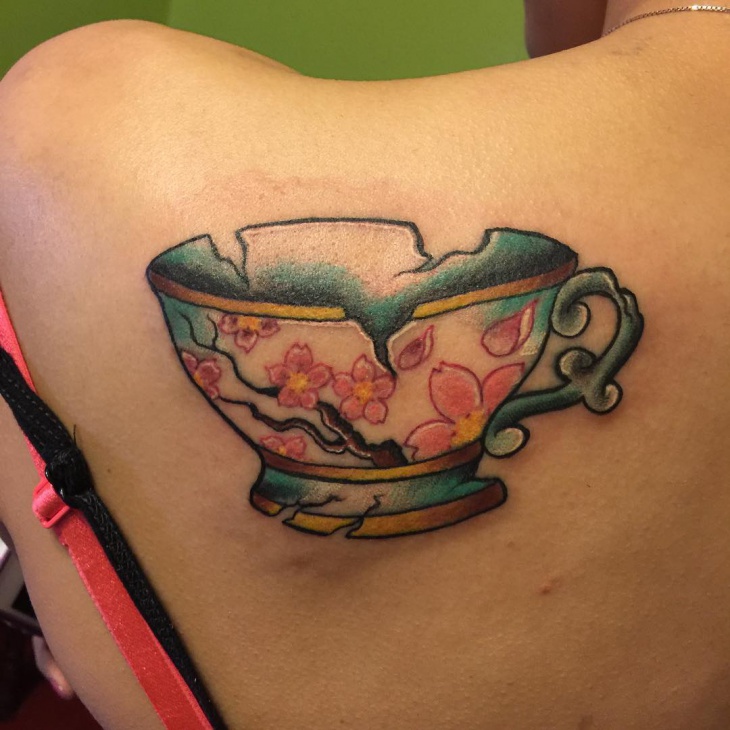 broken teacup tattoo