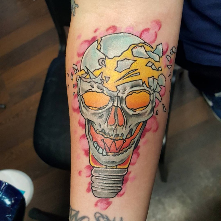 skull with light bulb tattoo
