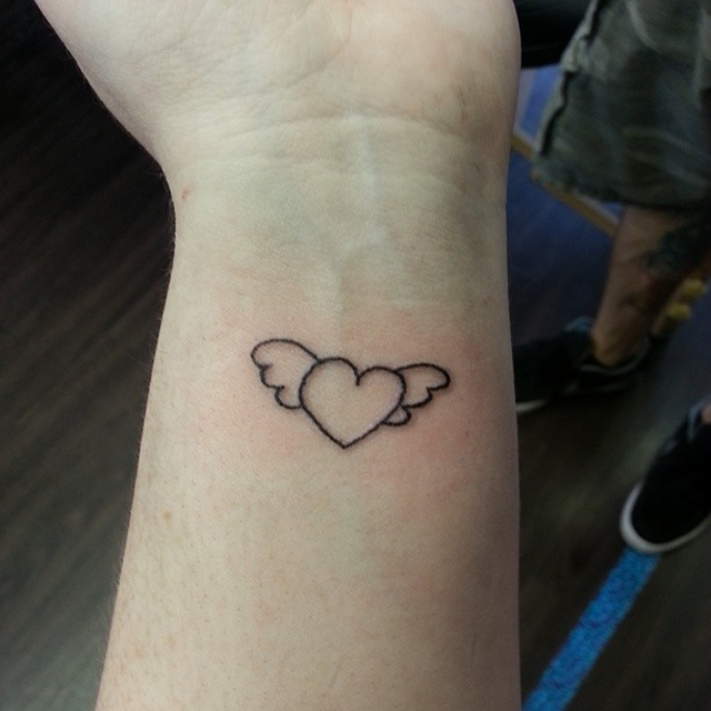 small heart with wings tattoo