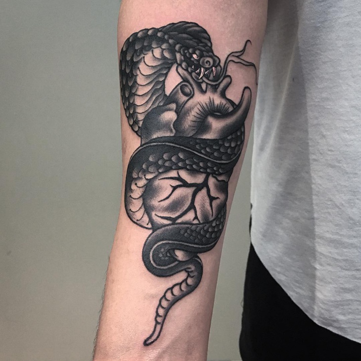 cobra forearm tattoo