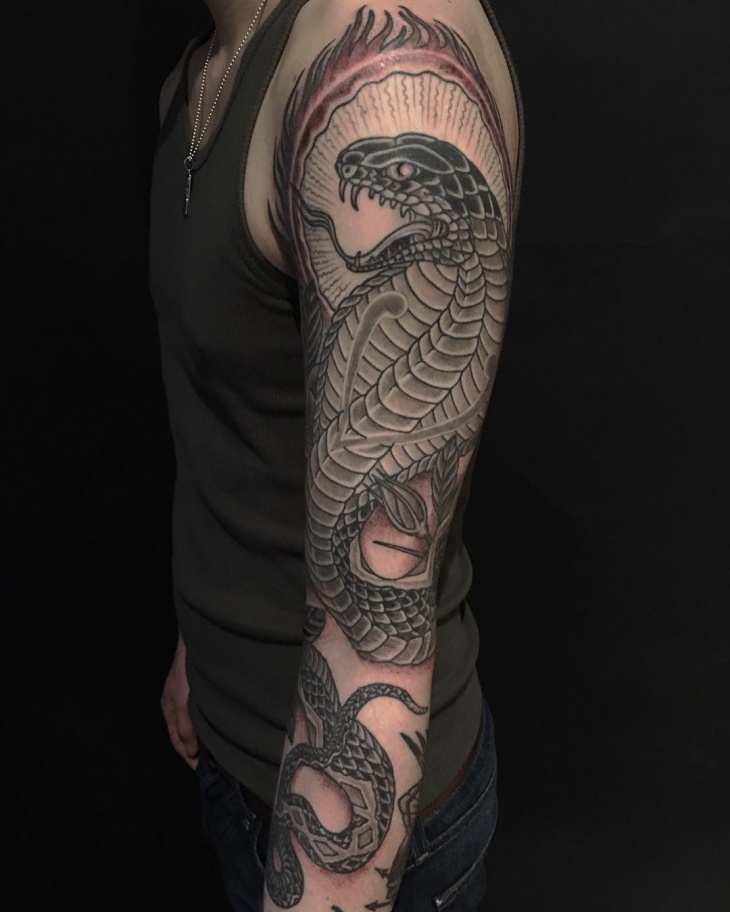 cobra tattoo on sleeve