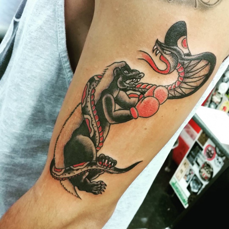 cobra tattoo on arm