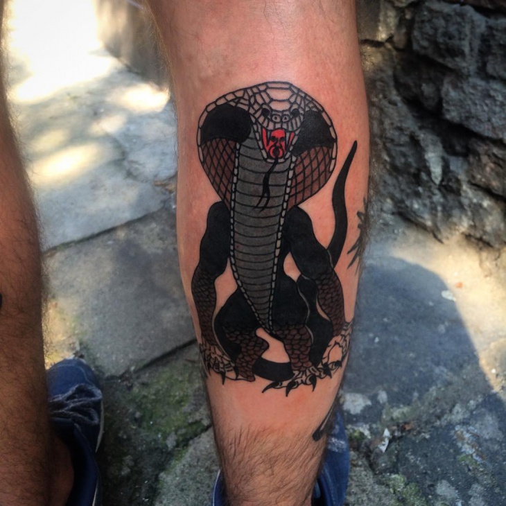 black work cobra tattoo idea