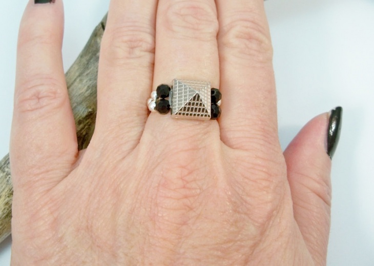 silver and black stretch ring