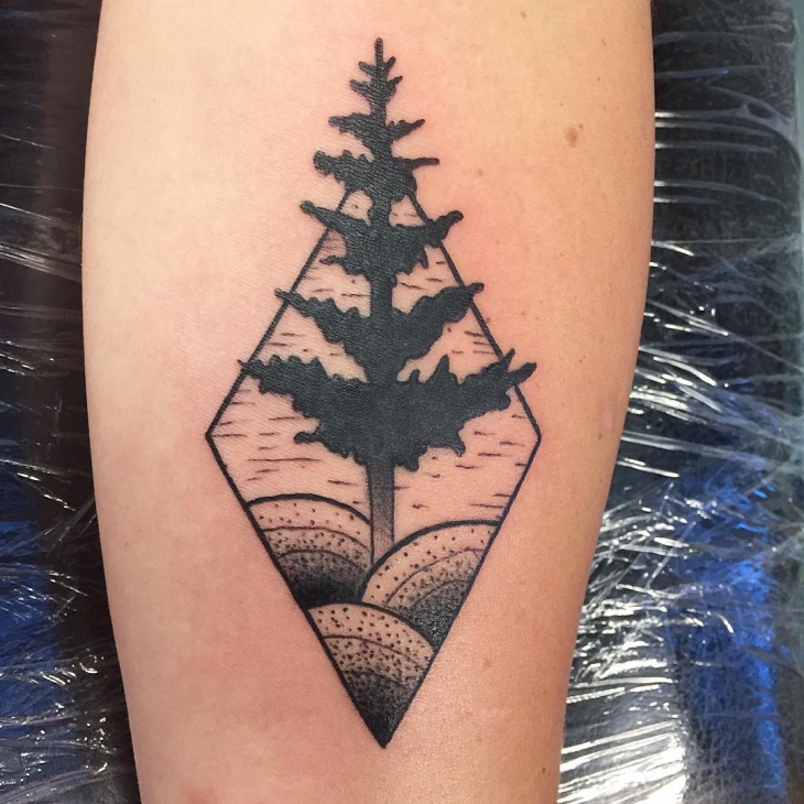 forearm pine tree tattoo