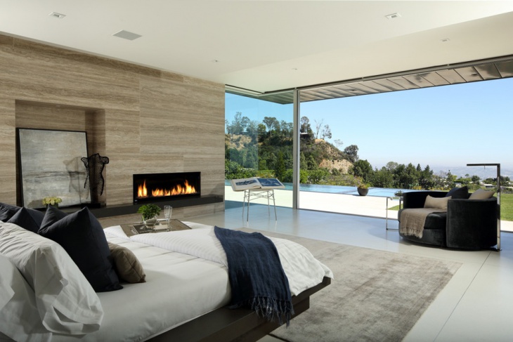 poolside bedroom with fireplace