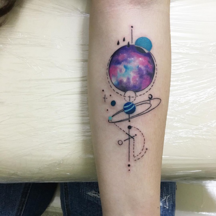 galaxy tattoo on forearm