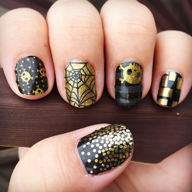black and gold skull nails