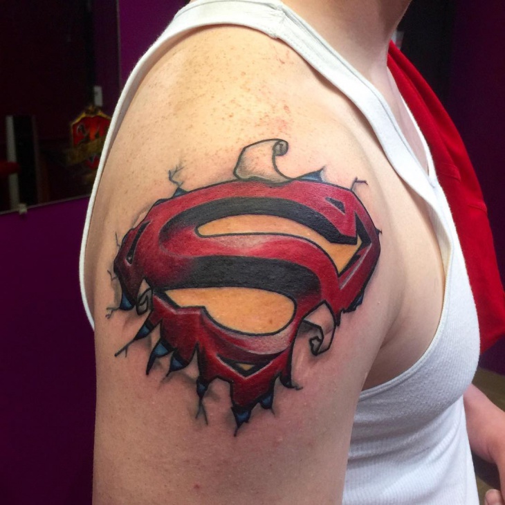 superman tattoo on shoulder