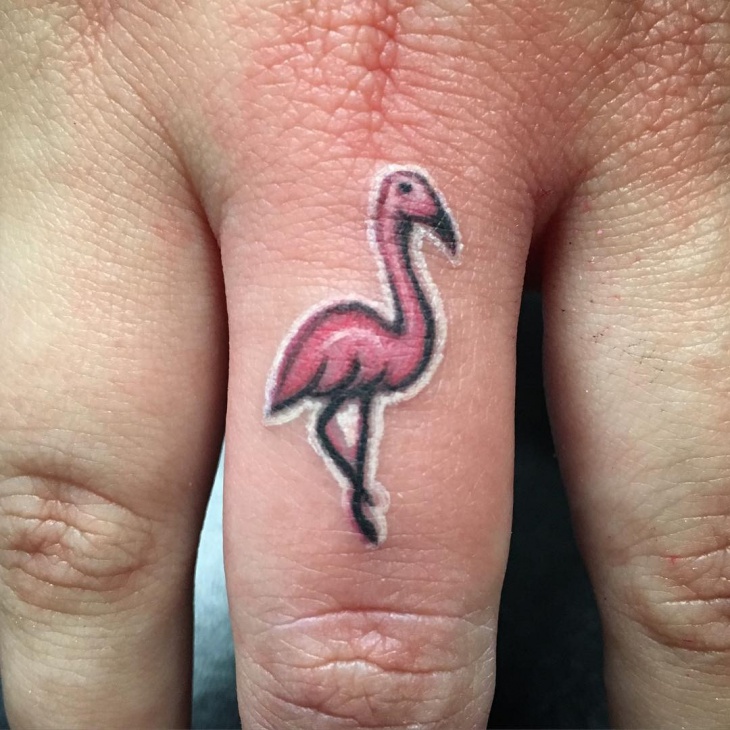 flamingo tattoo on finger